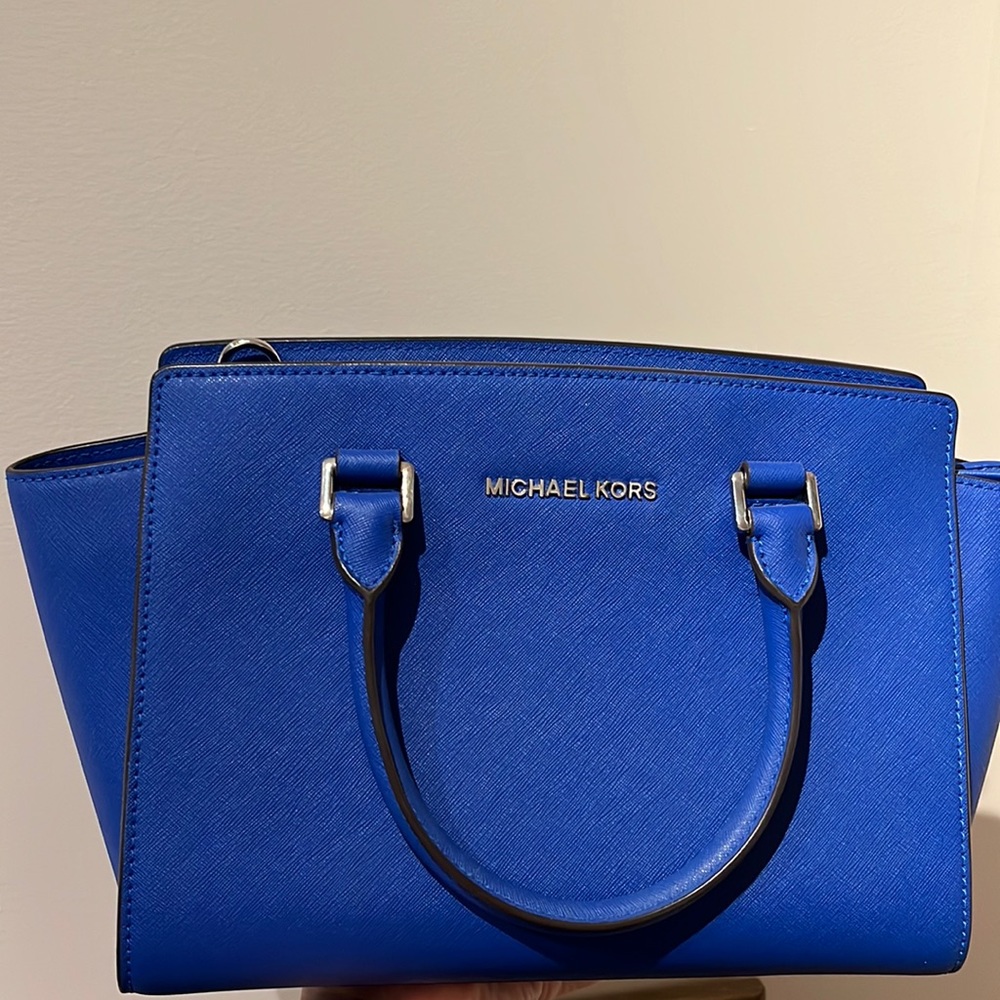 Gently used-like new Michael Kors blue purse. Shoulder strap not included. - Picture 1 of 3